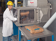 Sackentleersystem mit Glove-Box, Leersackverdichter und flexiblem Schneckenförderer