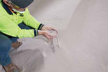 Hochleistungs-Abfüllstation für Big-Bags verarbeitet die abrasiven Mineralien Zirkon und Rutil