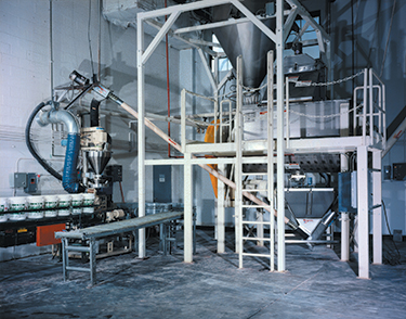Wie flexible Flexicon-Schneckenförderer helfen, pulverförmige Chemikalienmischungen abzuwiegen, zu mischen und zu Verpackungslinien zu fördern
