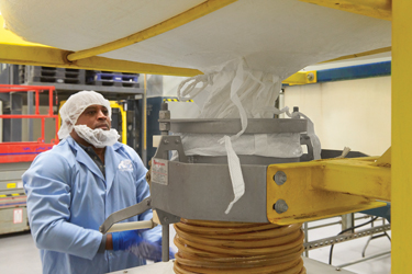 Lebensmittelzutaten-Distributor erweitert dank einer Big-Bag-Handhabungsanlage die Einnahmequelle in der Produktion