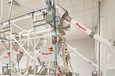 Goya Foods steigert die Produktion mit 16 automatischen Big Bag Entleerstationen
